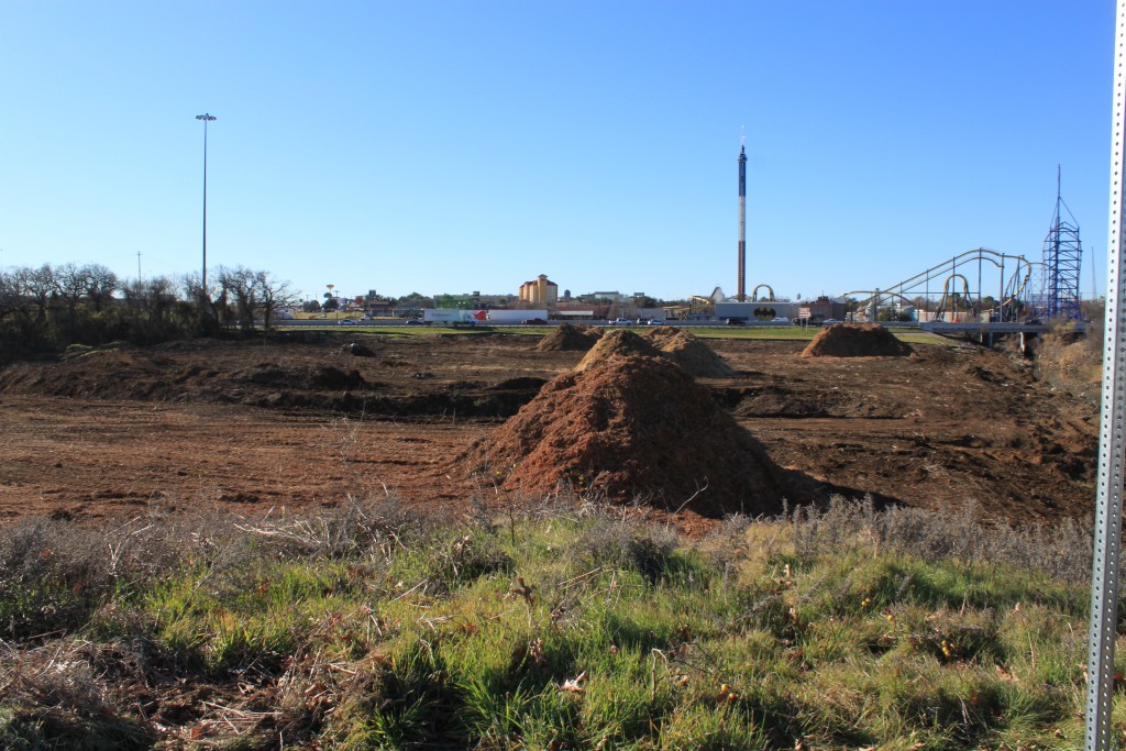 Mounds of dirt during right-of-way preparation activity.