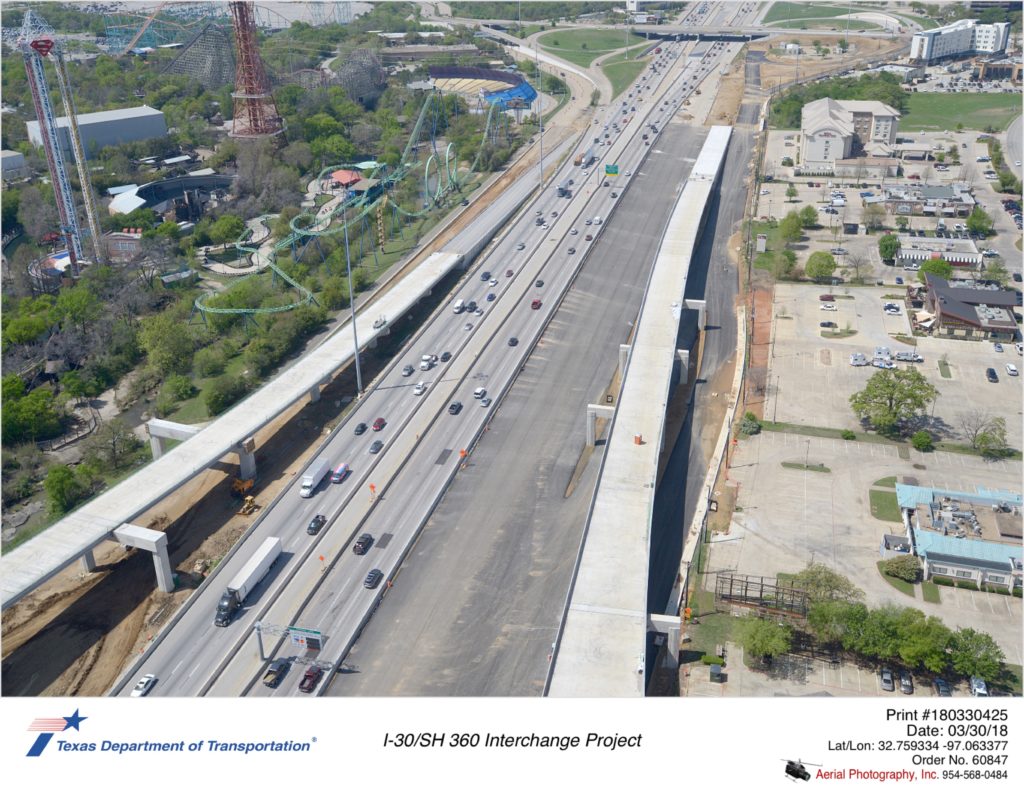 Ariel photograph taken March 2018 over I-30 looking west. Showing direct connectors feeding into I-30 west from SH 360 north. Also direct connector flowing from I-30