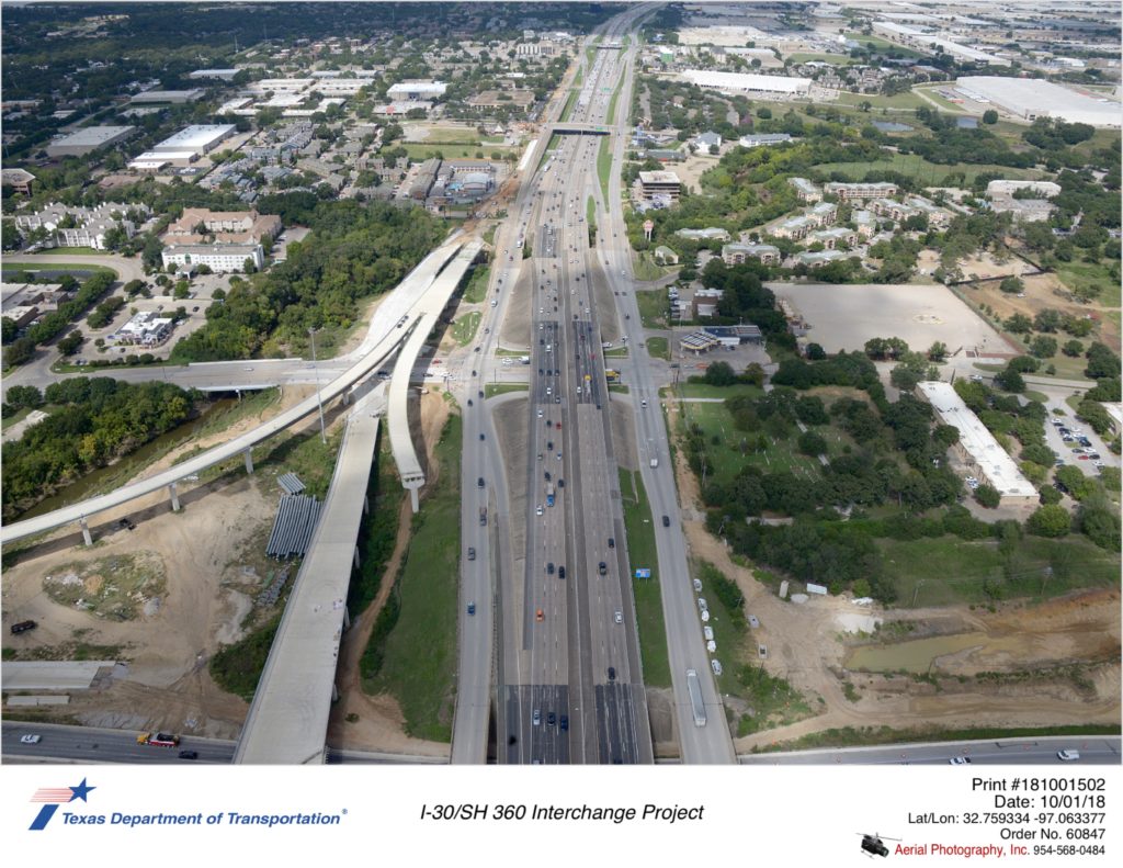 SH 360 looking north over I-30. New southbound frontage road and construction on west side of SH 360.
