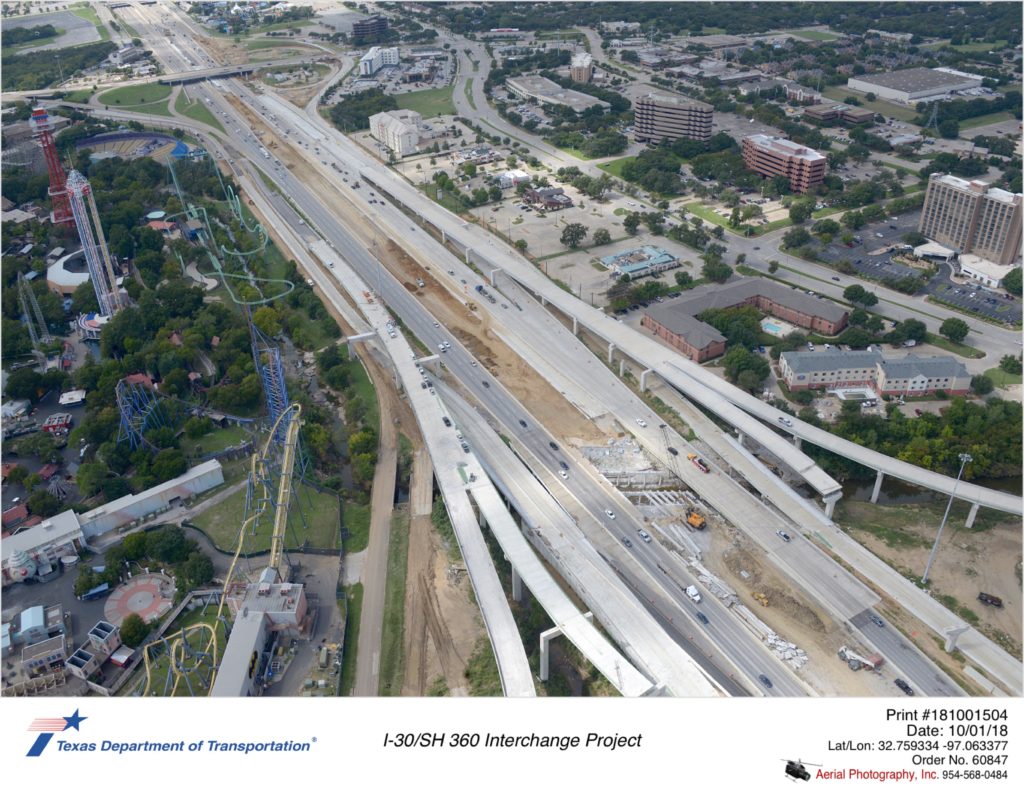 I-30 over Six Flags Dr looking northwest. Shows I-30 main lane construction in median over Johnson Creek and new collector-distributor connections.