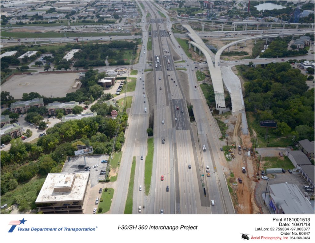 SH 360 looking south over Ave J at construction of southbound frontage road approaching Johnson Creek