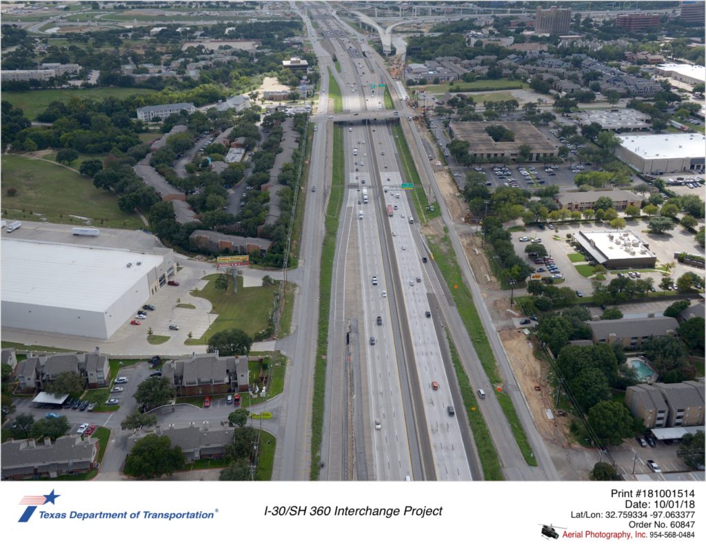 SH 360 looking south over Brown Blvd/Ave K at southbound frontage road construction