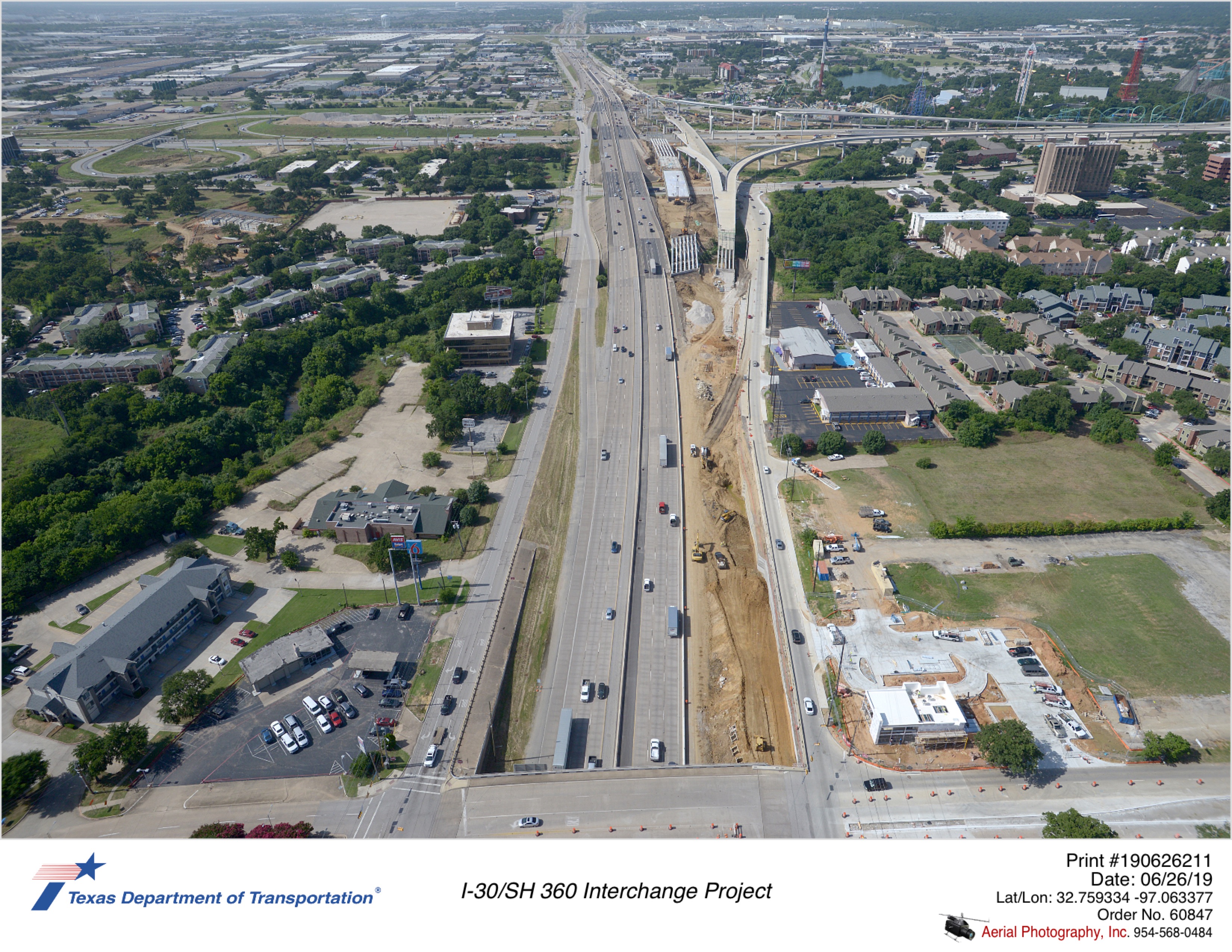 SH 360 looking south over Ave J. Construction of new SH 360 southbound main lanes and bridges seen.