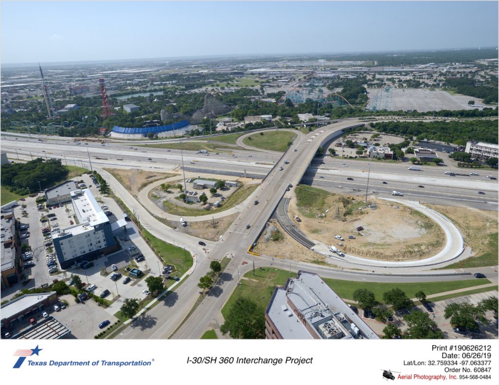 I-30/Ballpark Way interchange looking south. New construction of cloverleaf ramp to southbound Ballpark Way seen.