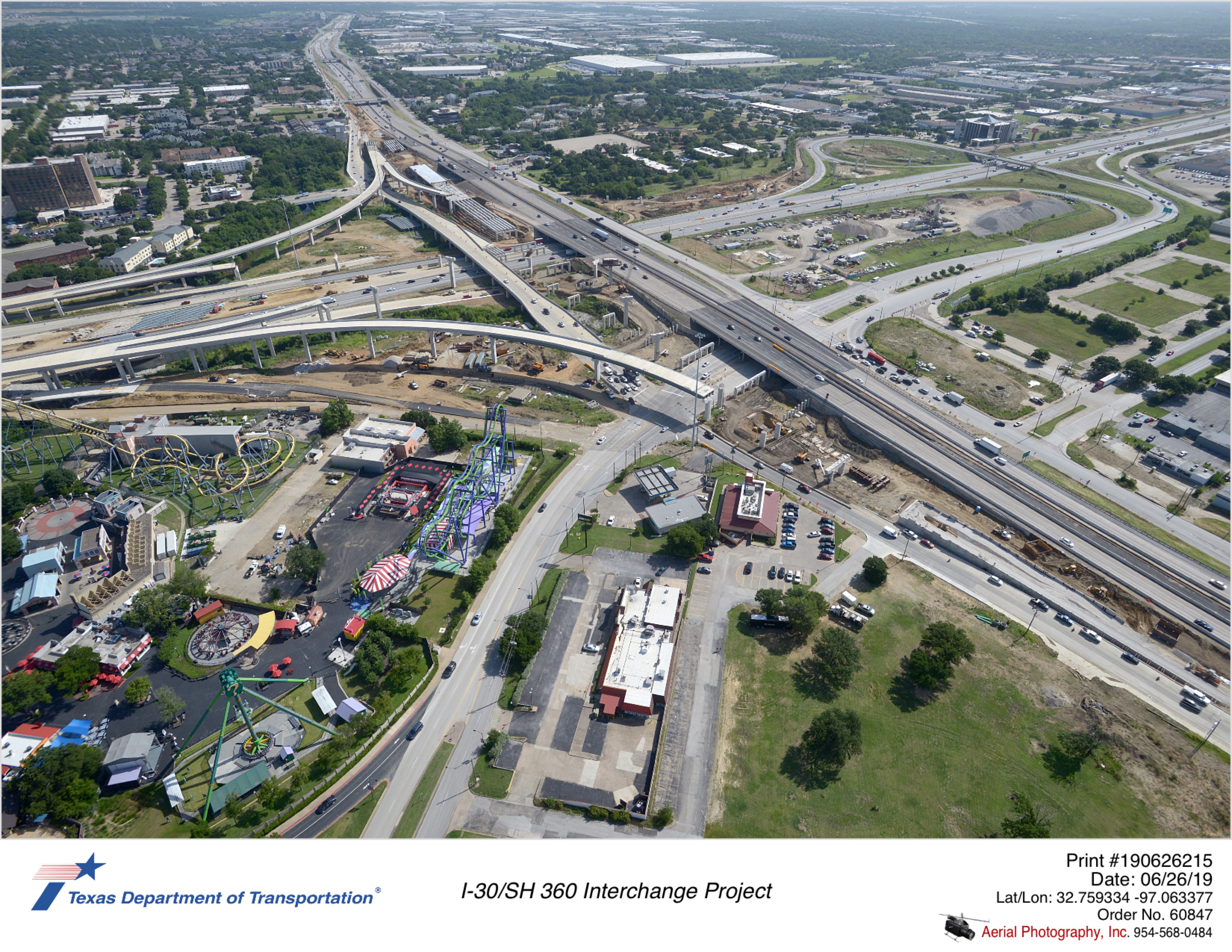 I-30/SH 360 interchange looking northeast. Construction of east-to-south direct connector south of Six Flags Dr seen.