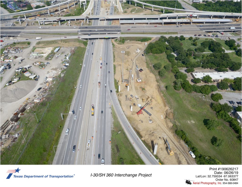 I-30/SH 360 interchange over Six Flags Dr looking west. Construction of westbound direct connectors on north side of I-30 seen.