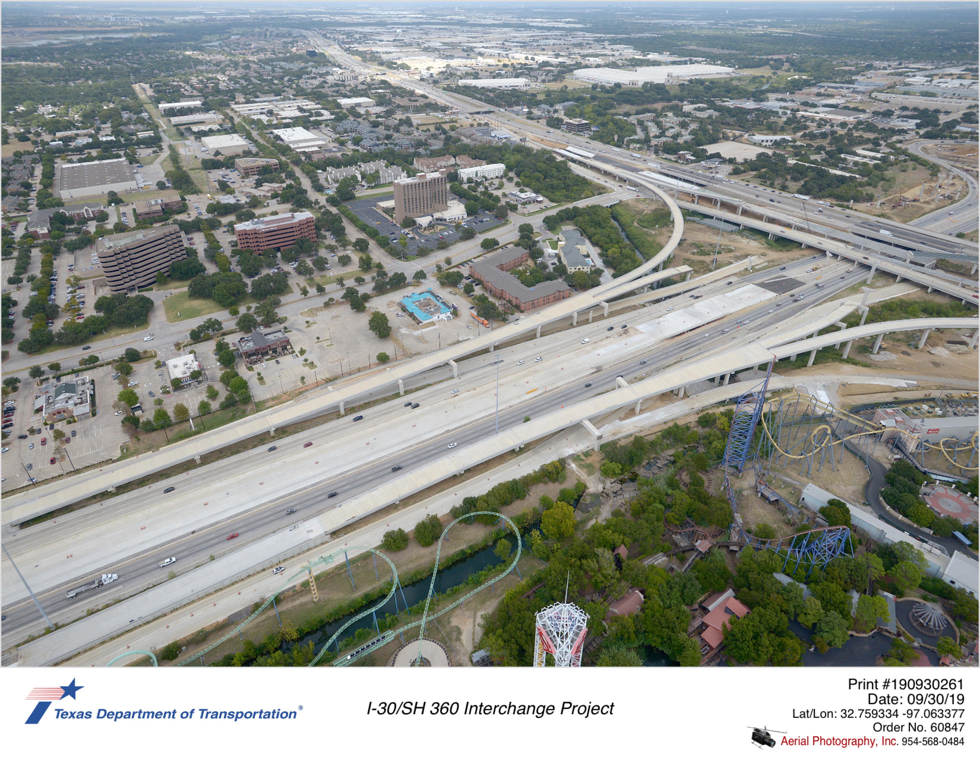 I-30 construction looking northeast at SH 360 underpass. Completed paving work Johnson Creek to west. New direct connector construction continuing.