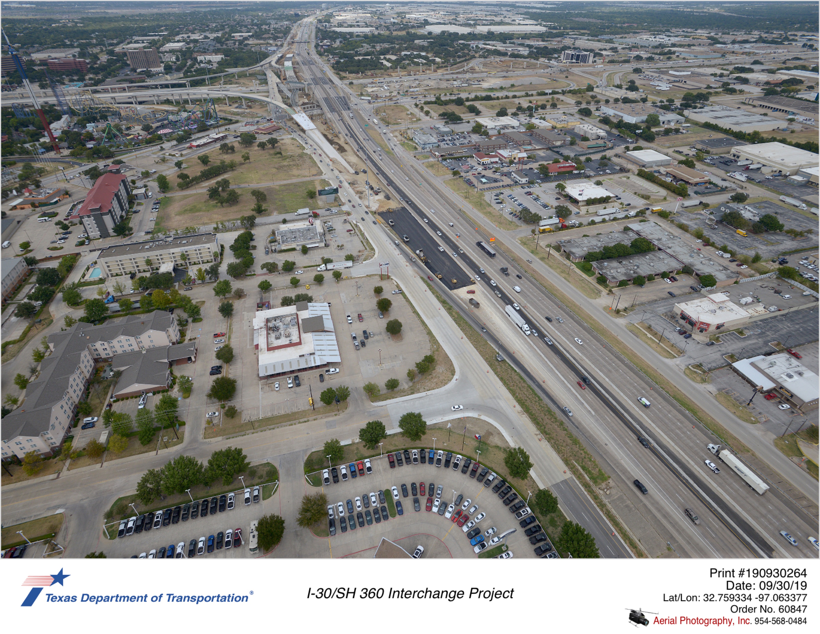 SH 360 looking north to I-30. Construction of direct connector landings for southbound SH 360 mainalnes.