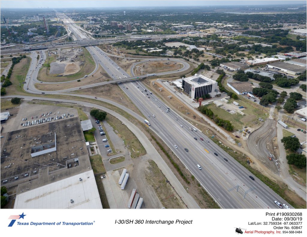 I-30 looking west to SH 360. Construction on Ave F and Ave G. Construction for westbound direct connectors.