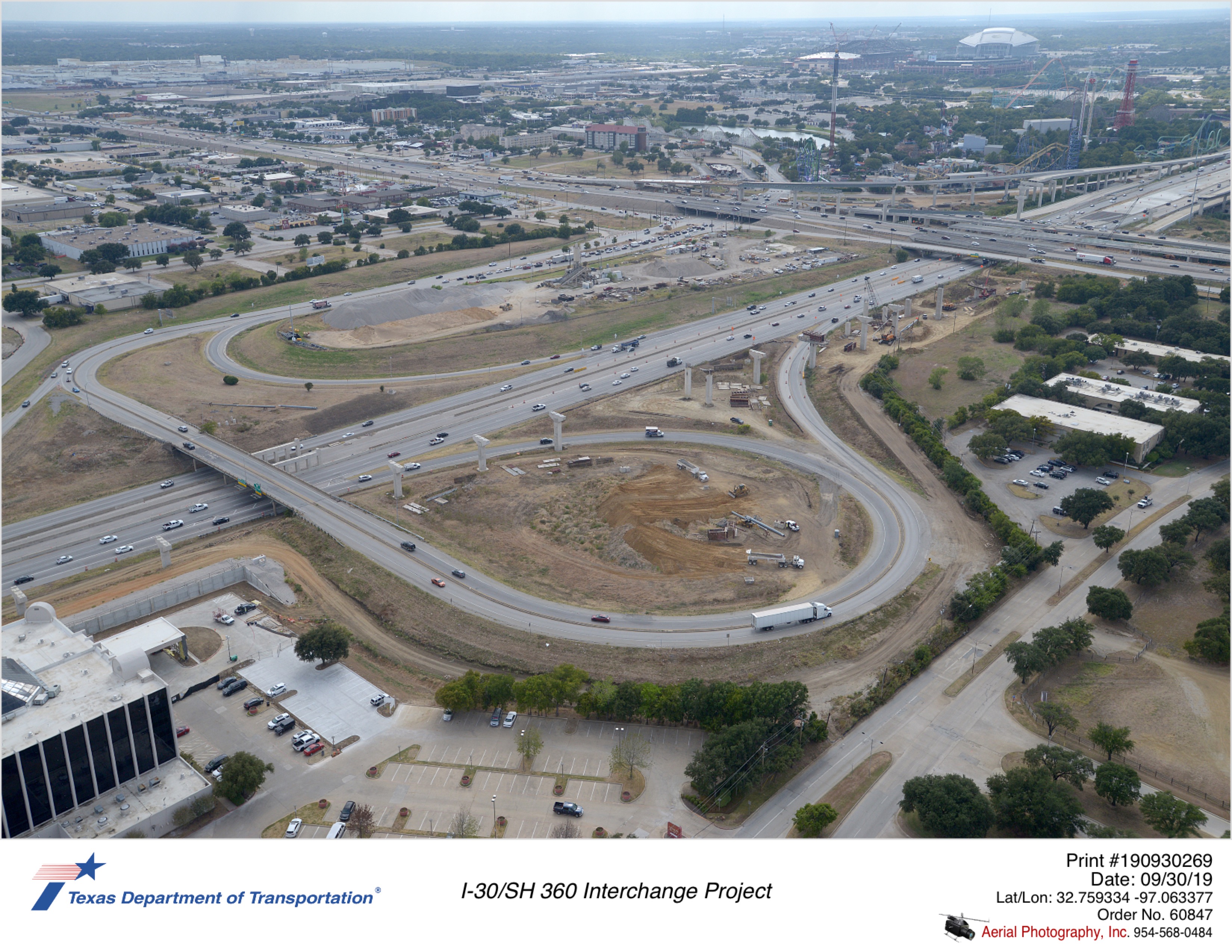 I-30/SH 360 interchange looking southwest. Construction of direct connector ramps in northeast quadrant.
