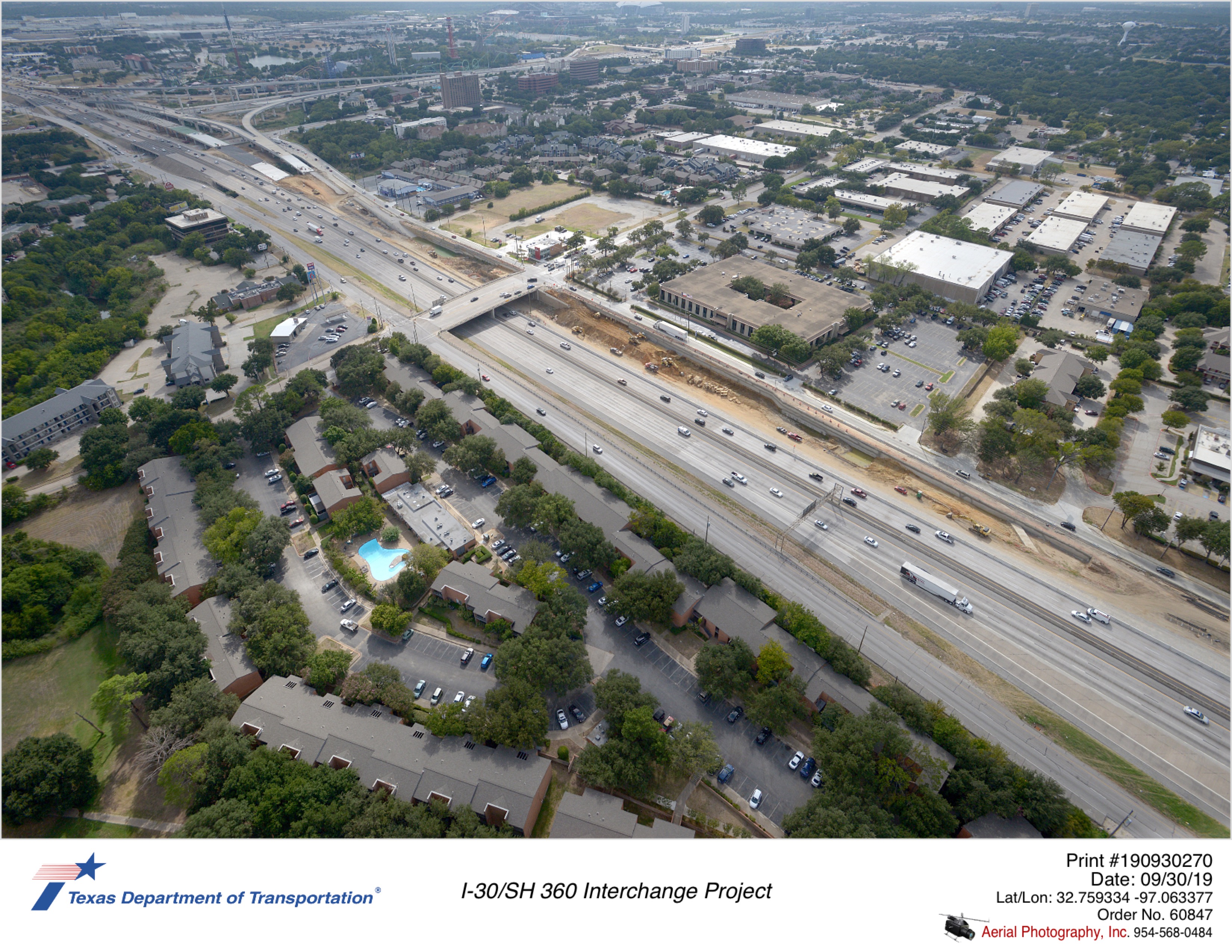 SH 360 looking at Ave J in southwest direction. Construction of southbound frontage road retaining walls north and south of Ave J.