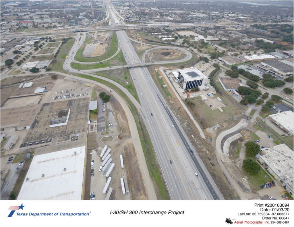 I-30 looking west to I-30/SH 360 interchange. Construction shown on Ave F and Ave G.