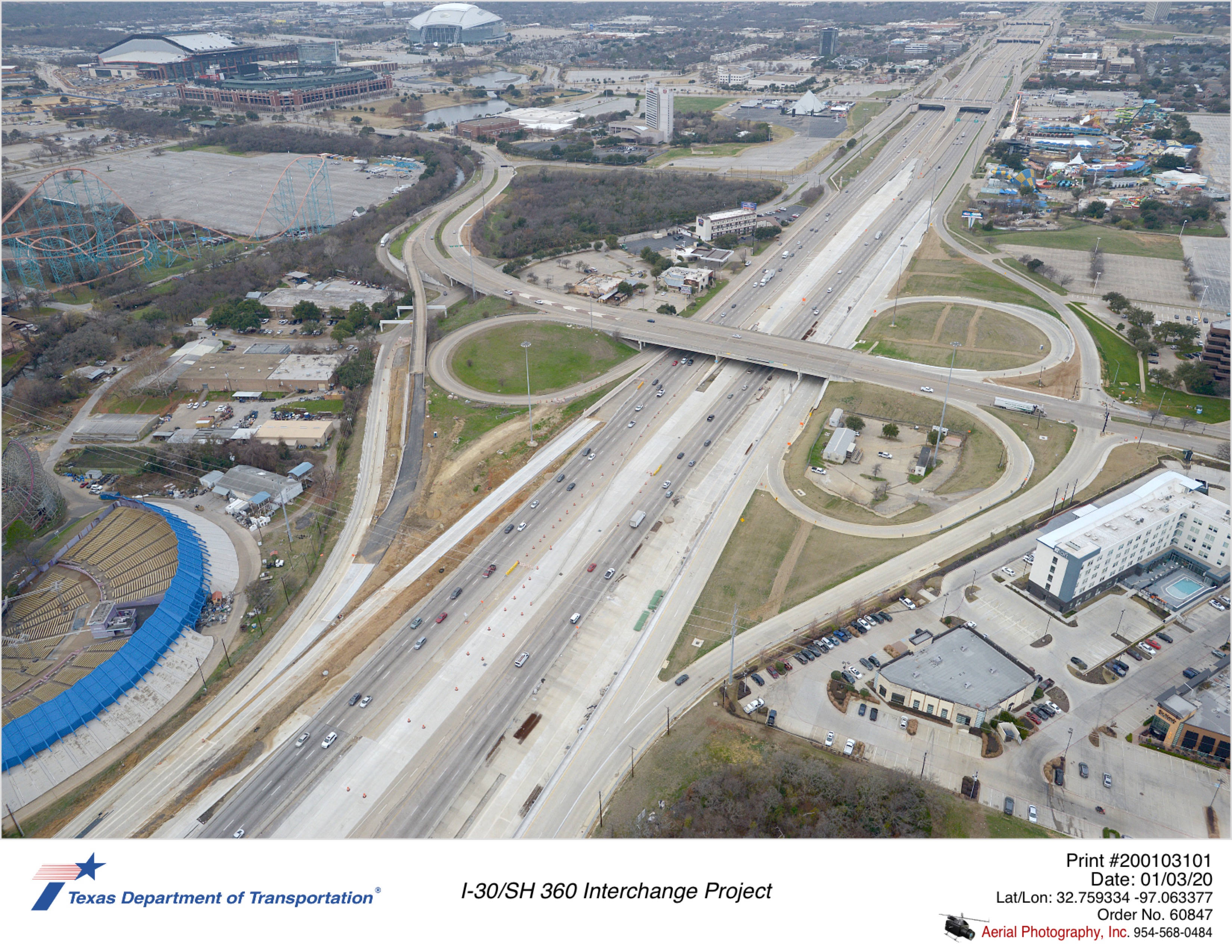 I-30 looking southwest with Ballpark Way interhcange in mid-ground. Active construction shown on Copeland Rd and new eastbound exit to Copeland Rd.