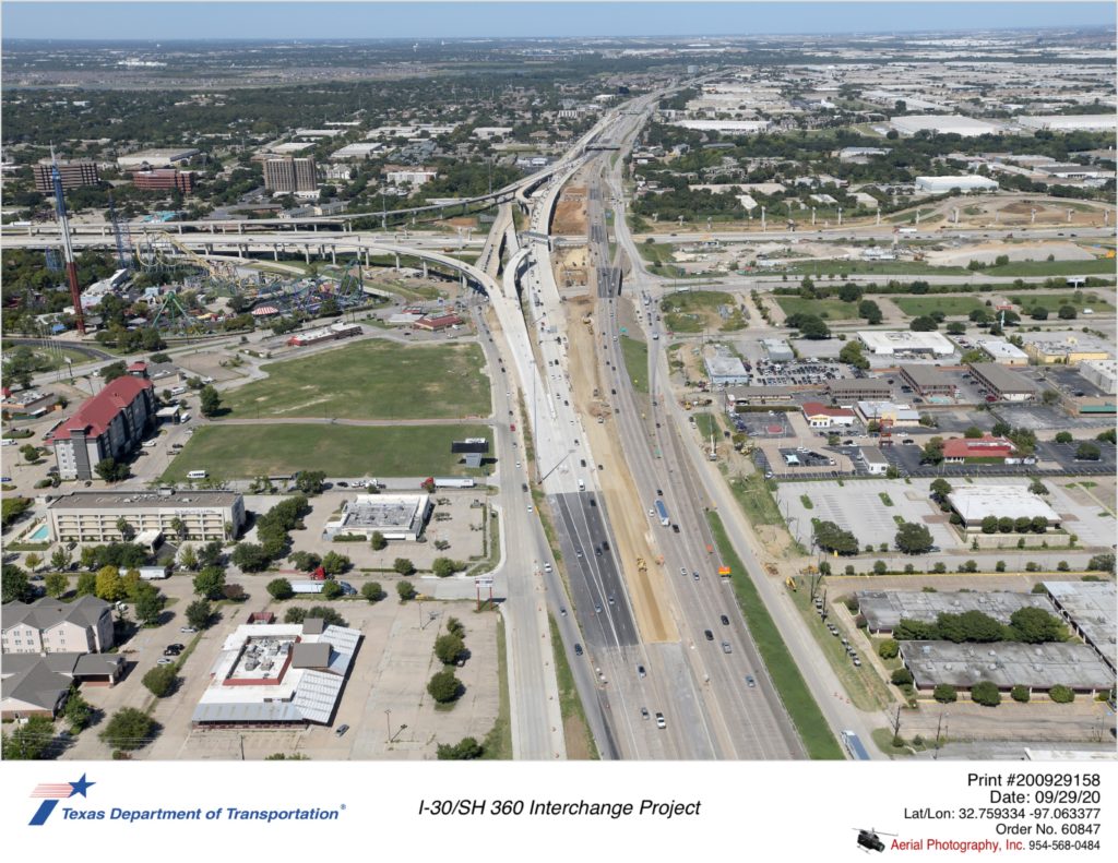 SH 360 looking north at interchange with I-30. New southbound mainlanes shown in use and demolition of old southbound mainlanes shown.