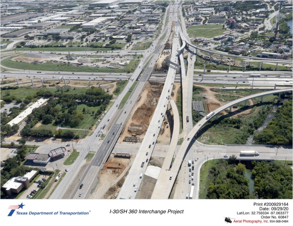 SH 360 looking south with Lamar Blvd intersection in foreground. SH 360 traffic now using new bridge across I-30.