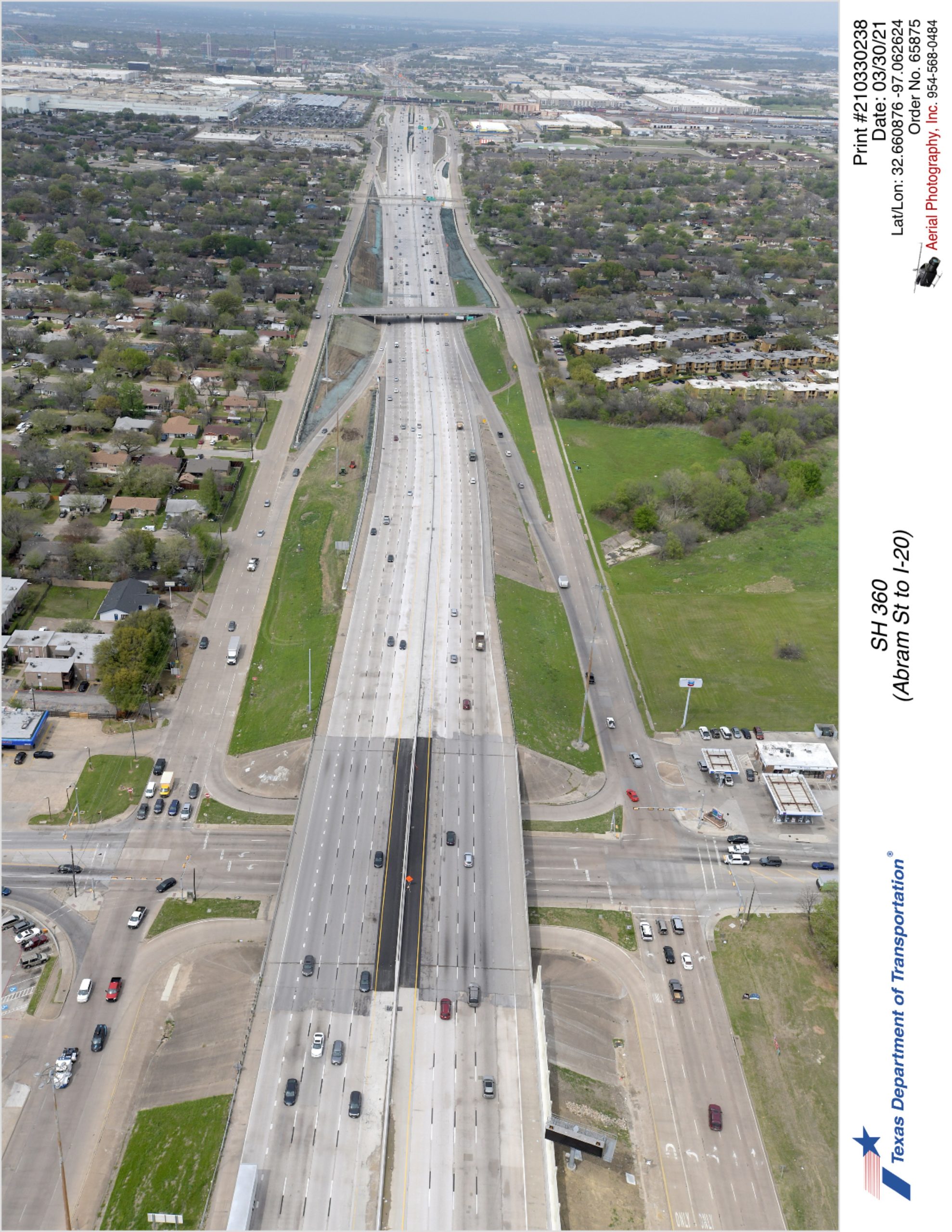 SH 360 looking north over Park Row Dr interchange. Completed interior lane in use.