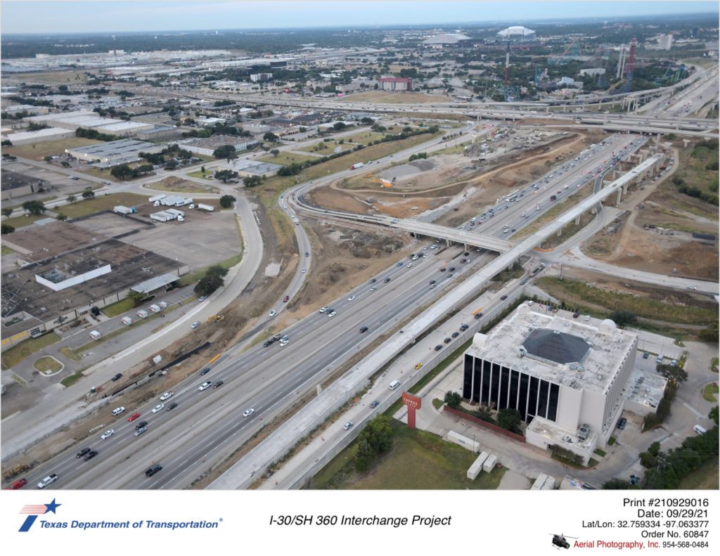 I-30/Six Flags Dr interchange looking southwest. Excavation and structure work shown.