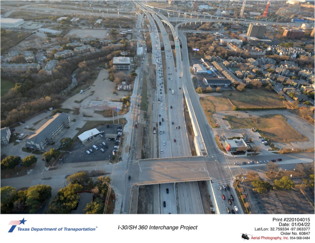 SH 360 looking south over Ave J. Construction of SH 360 northbound frontage road and mainlanes shonw.