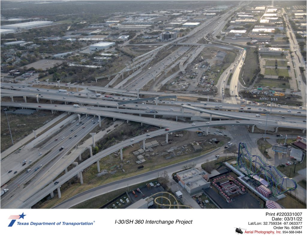 I-30/SH 360 interchange looking east-northeast over Six Flags. Progress shown on east side of SH 360.