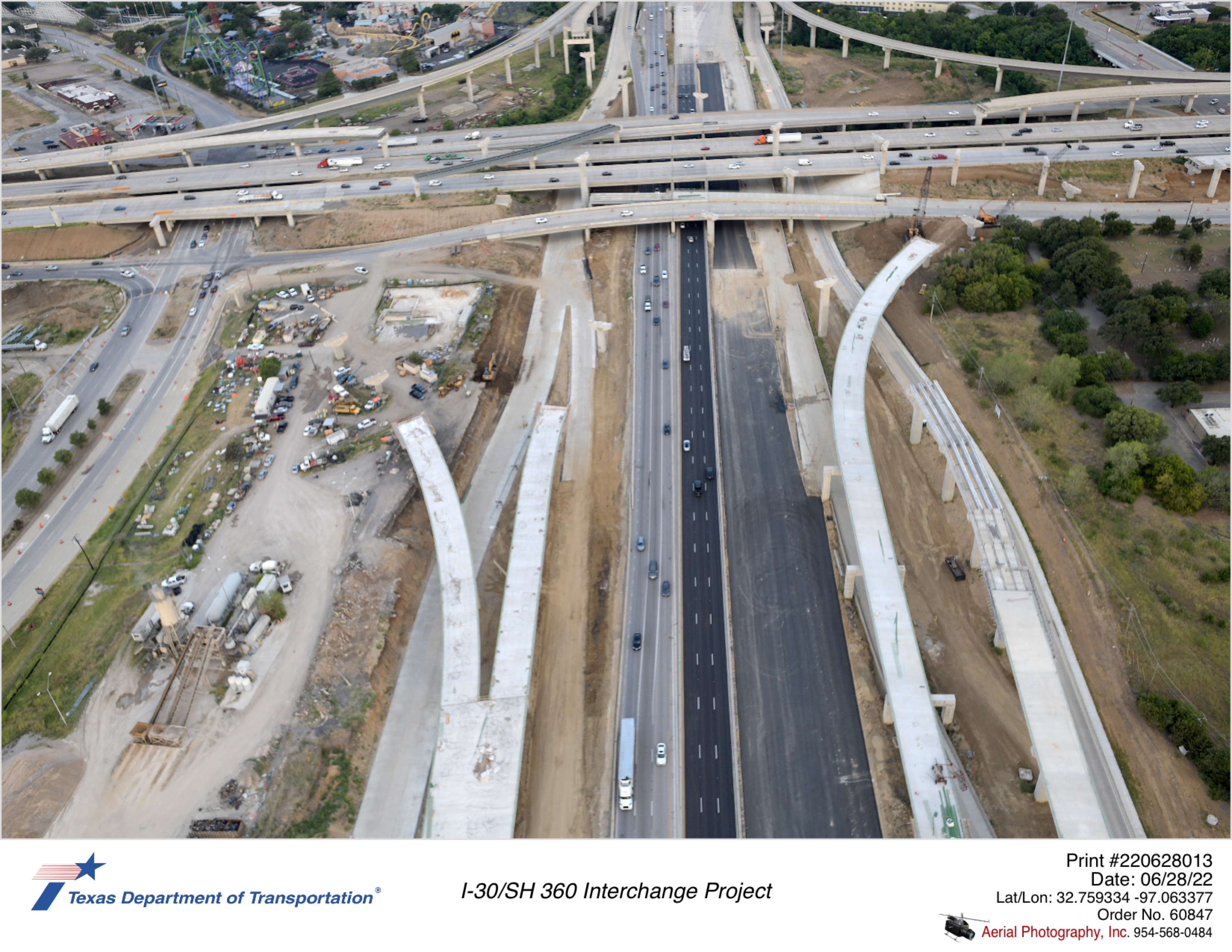I-30/SH 360 interchange looking west. Image shows construction of I-30 permanent westbound mainlanes and partial construction of new direct connectors.