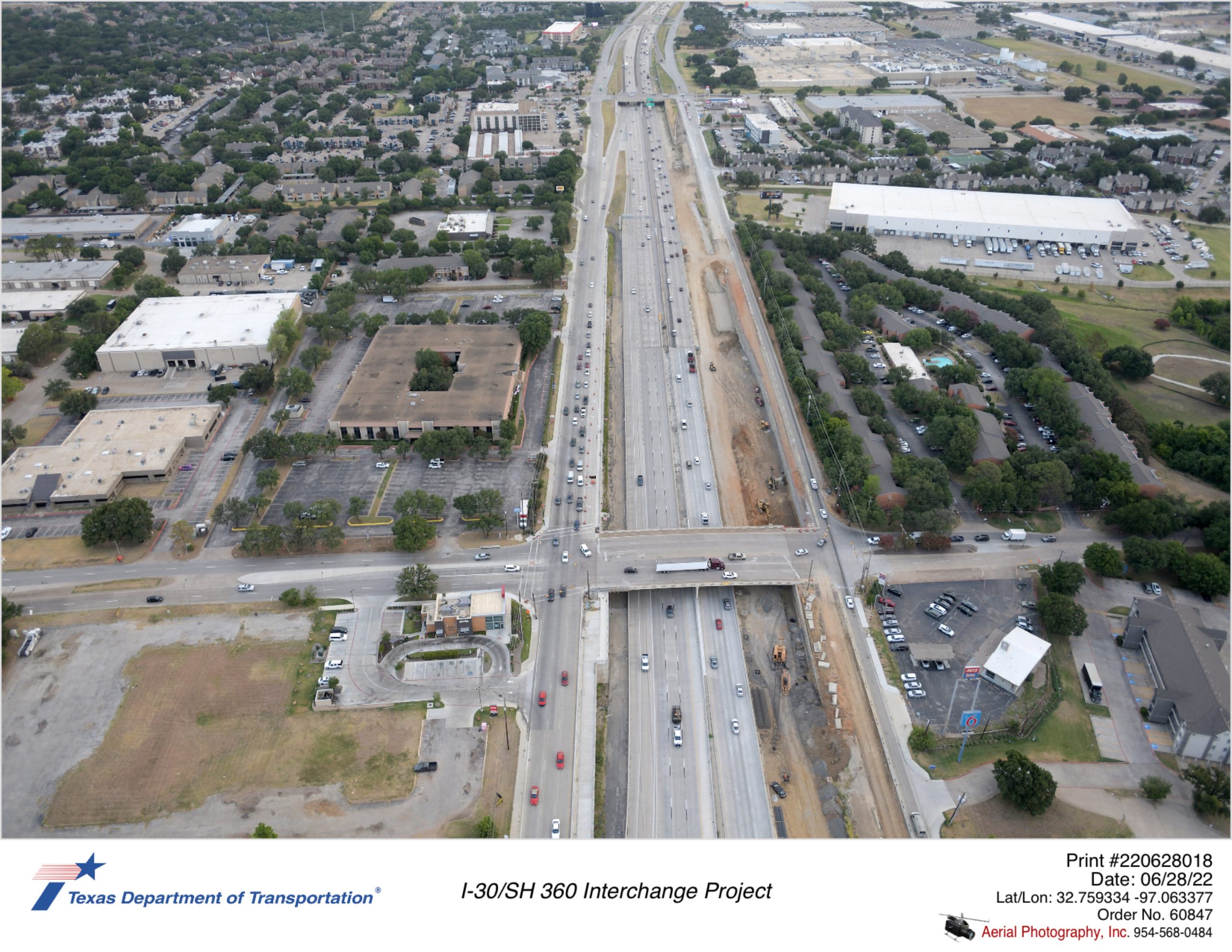 SH 360 looking north over Ave J interchange. Construction of northbound frontage road is shown.