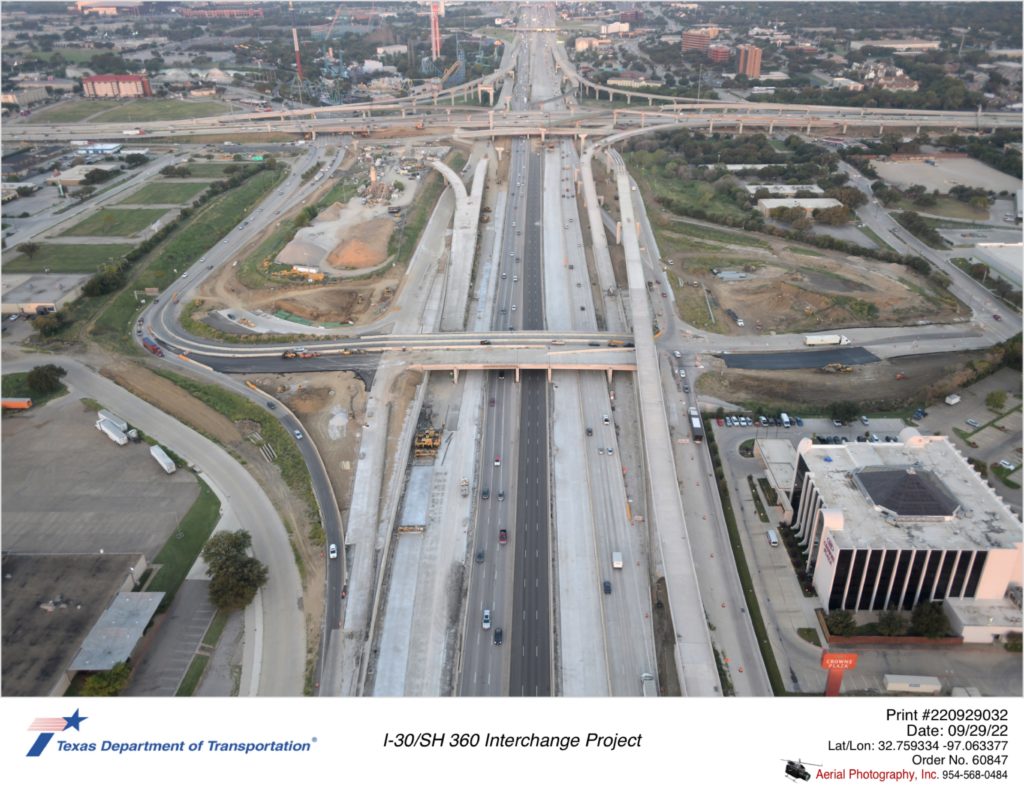 I-30 looking west over Six Flags Dr interchange and SH 360 interchange in background.