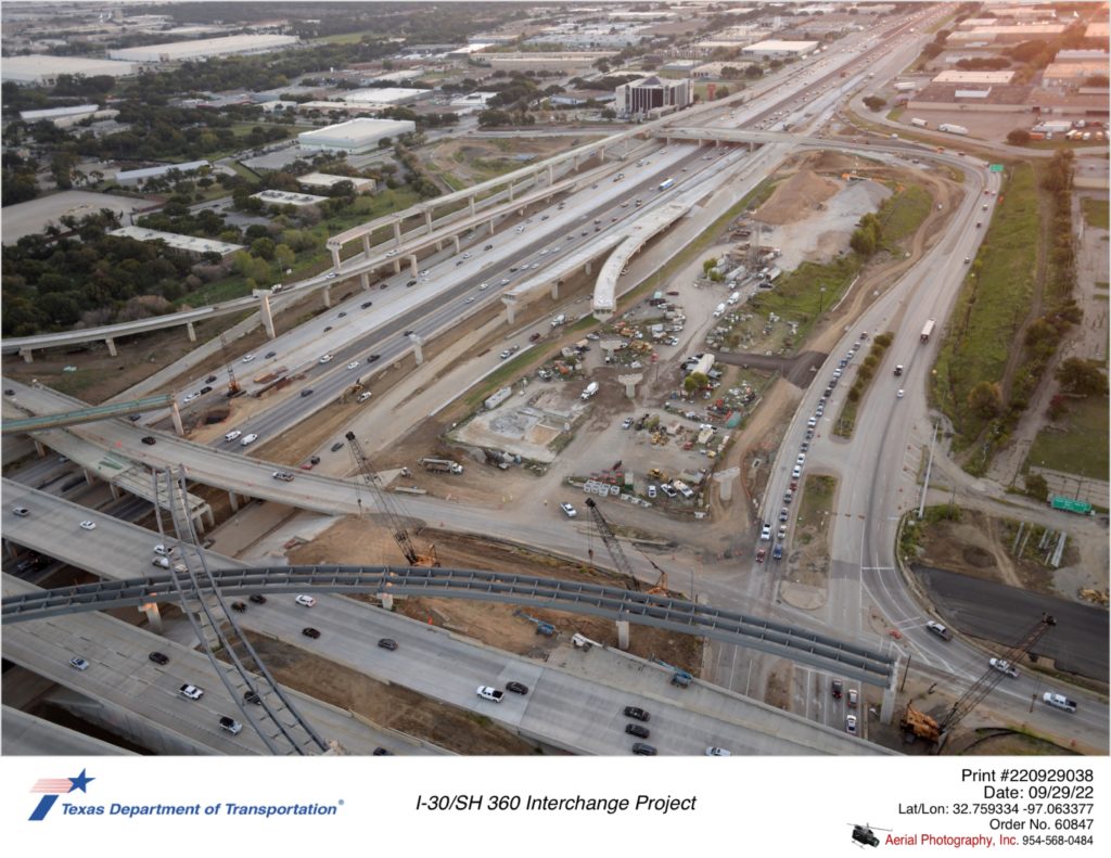 I-30/SH 360 interchange looking northeast. Direct connector construction continues.