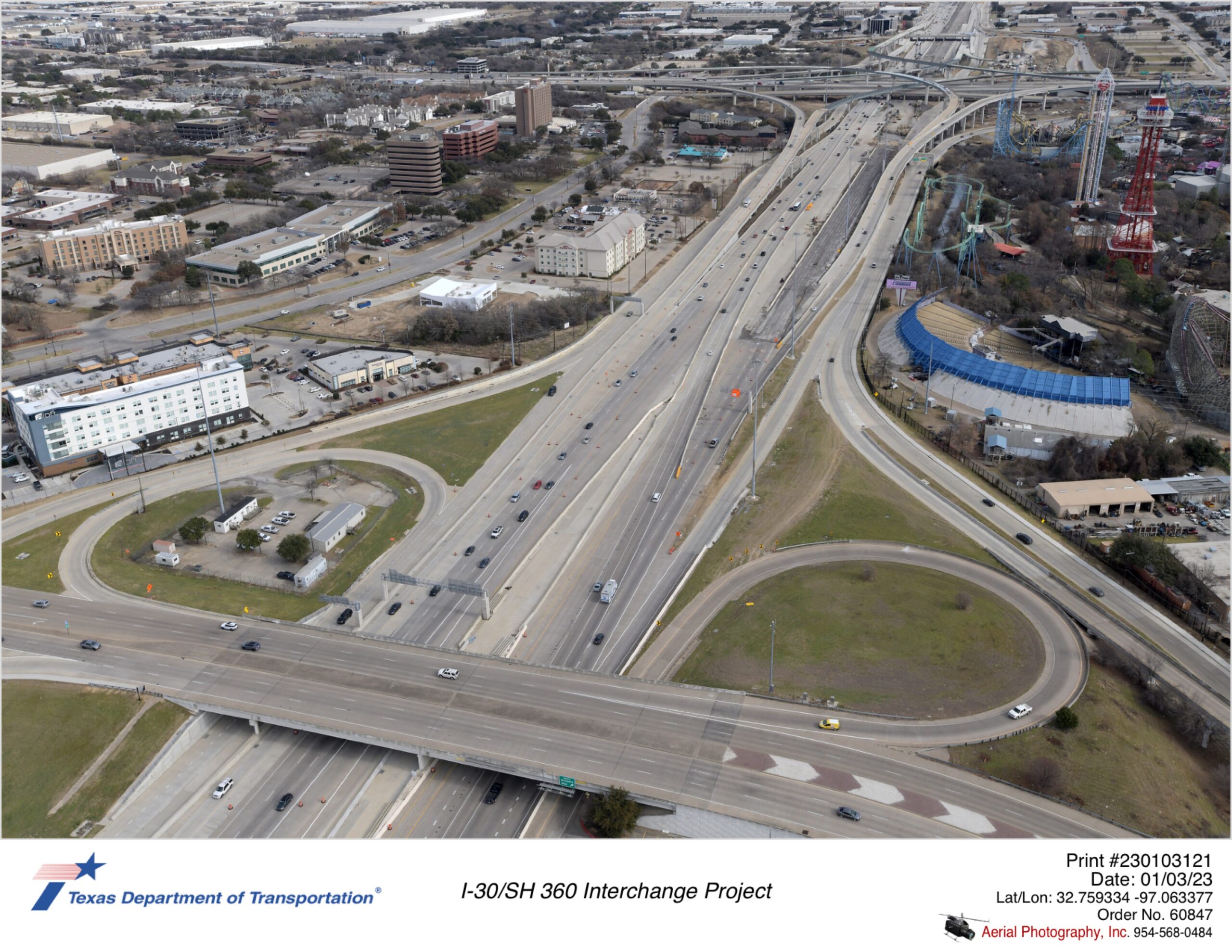 I-30 looking east at Ballpark Way interchange in foreground and SH 360 interchange in background.