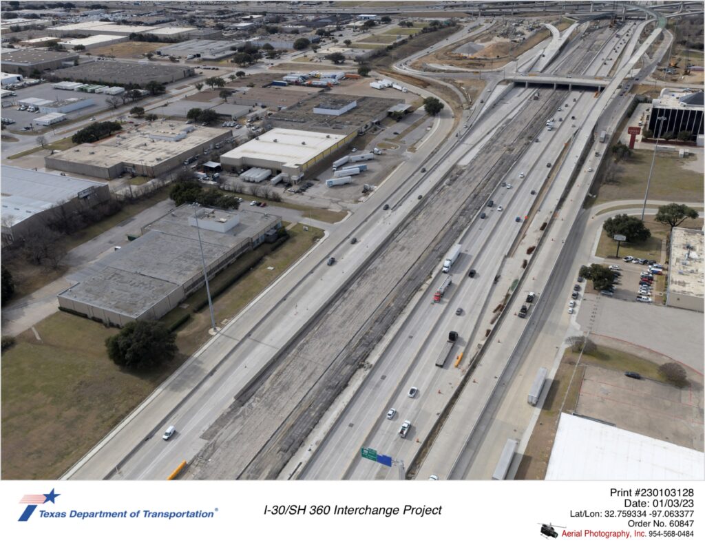 I-30 looking west at Six Flags Dr and SH 360 interchanges in background.