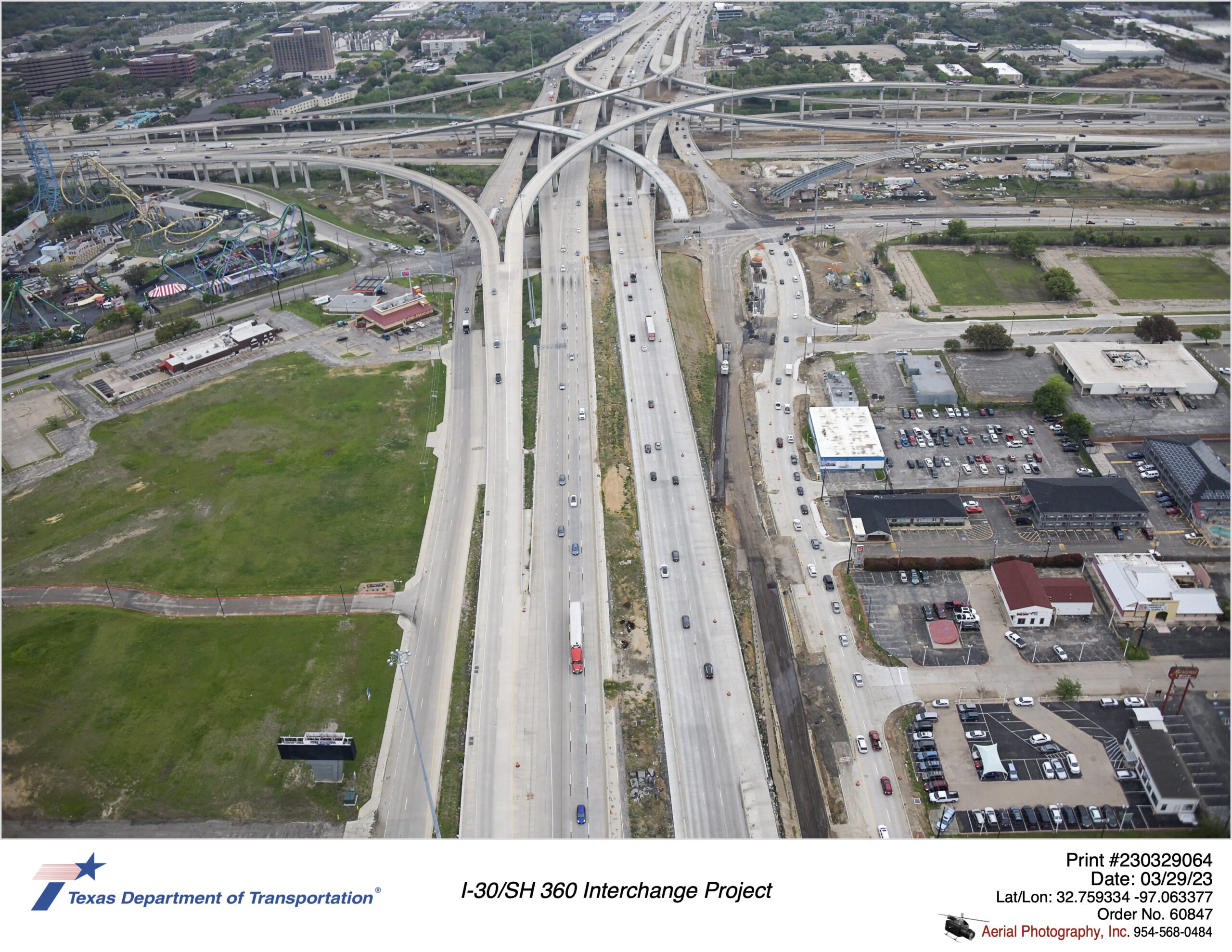 SH 360 looking north at I-30 interchange highlighting new northbound frontage road and removal of old frontage road. March 2023.