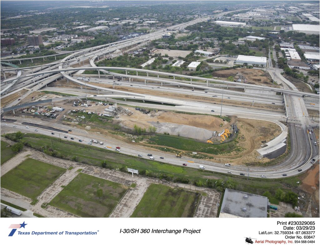 Six Flags Dr between I-30 and SH 360 highlighting old road removal. March 2023.