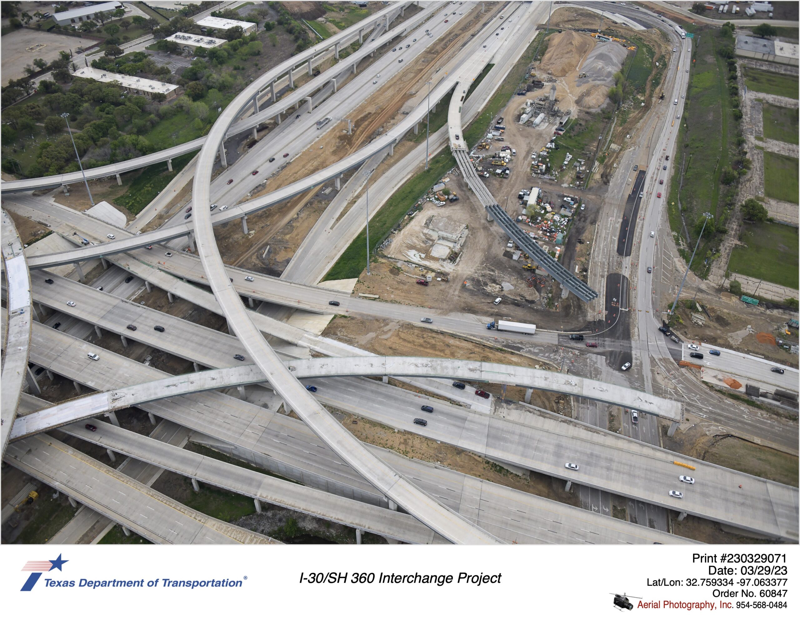 I-30 and SH 360 interchange focusing on construction of Six Flags Dr and northbound direct connector. March 2023.