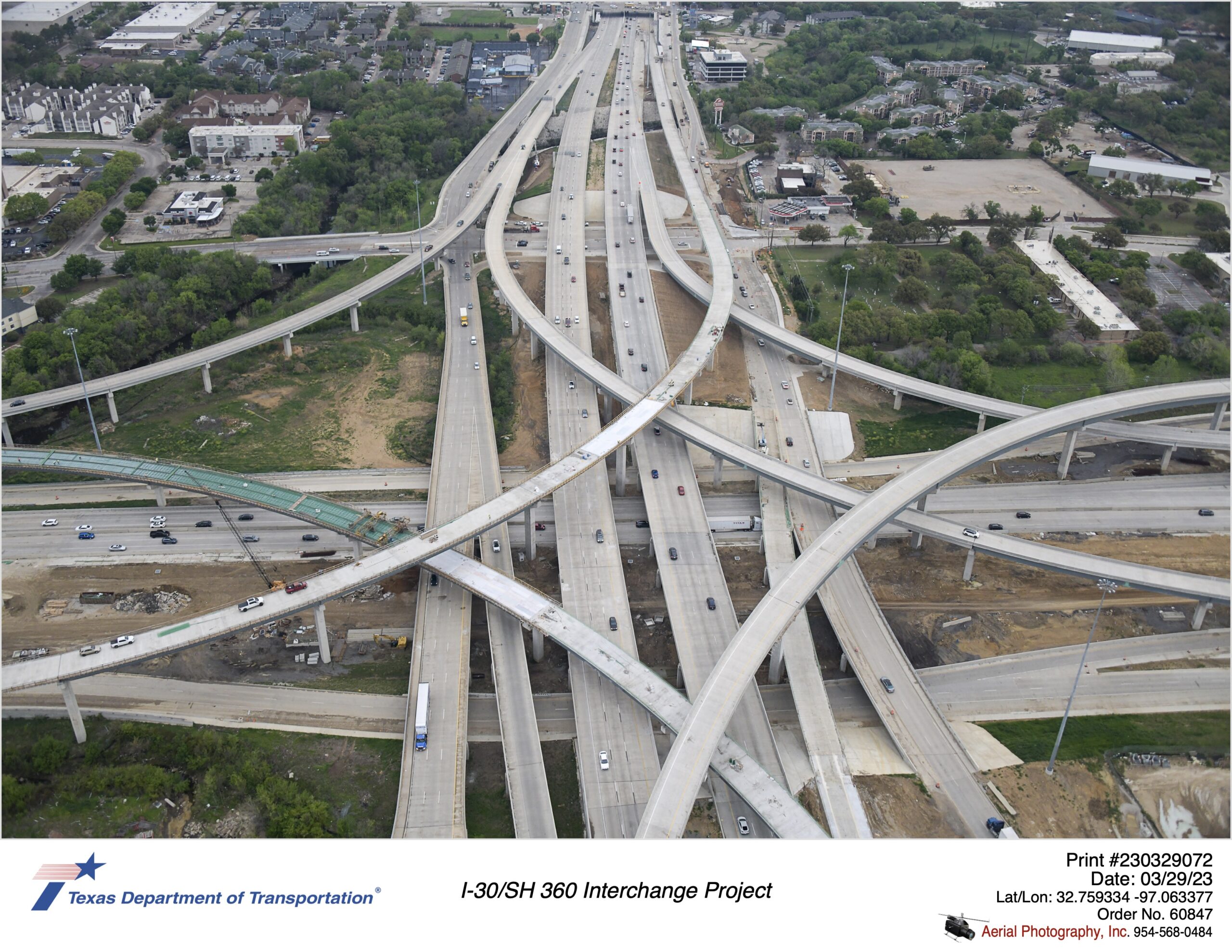 I-30 and SH 360 interchange looking north highlighting direct connector construction. March 2023.