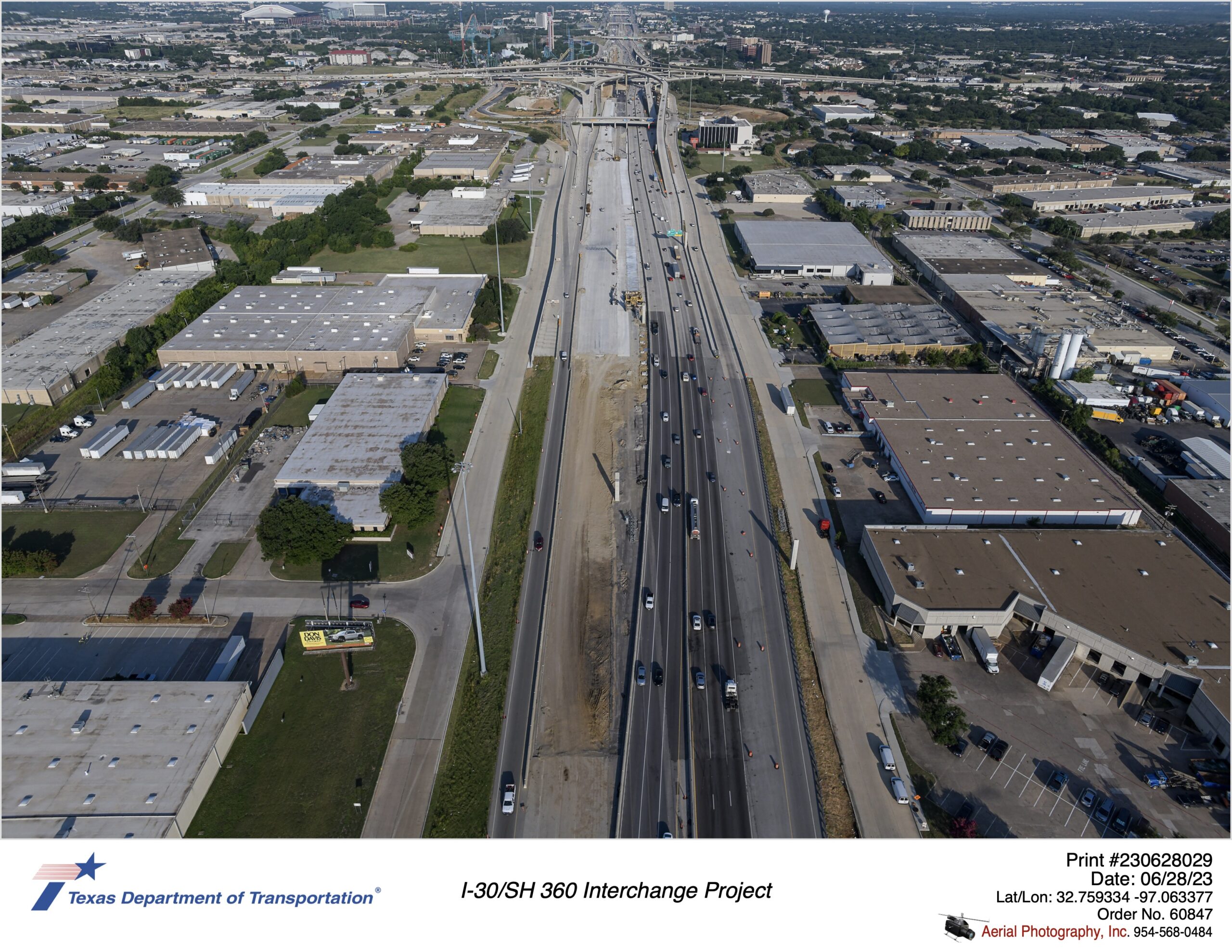 I-30 looking west over Great Southwest Pkwy interchange. Construction of eastbound mainlanes shown in image.