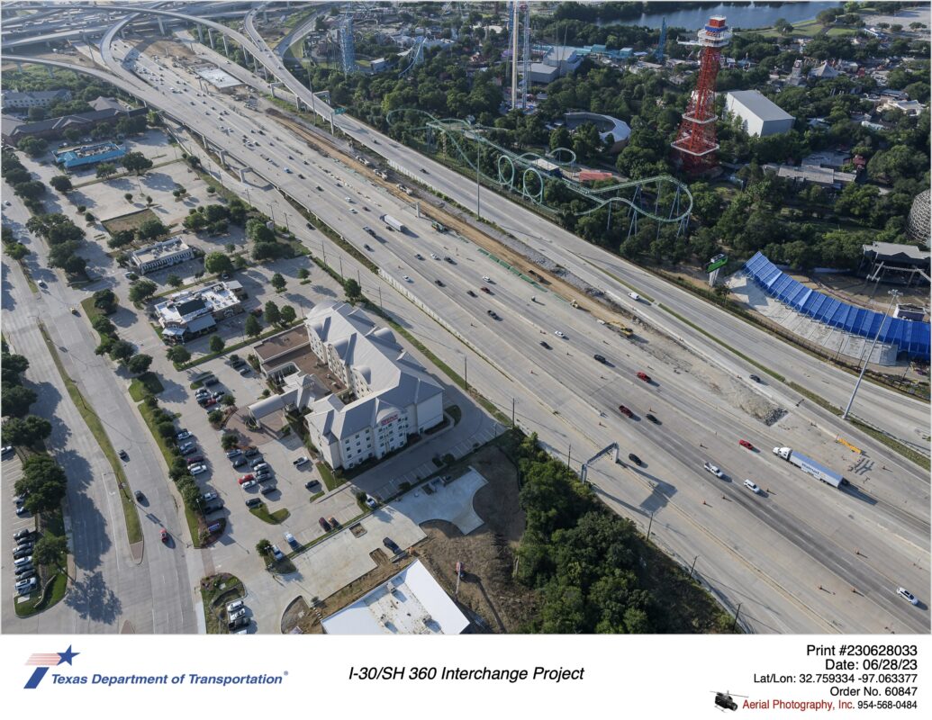 I-30 looking east at SH 360 interchange in background. Image shows construction of new eastbound lanes and bridge over Johnson Creek.