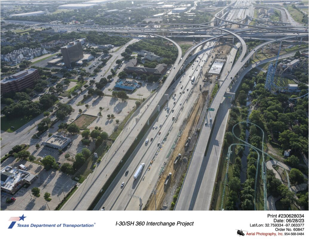 I-30 looking east at SH 360 interchange. Image shows construction of eastbound mainlanes and bride over Johnson Creek.