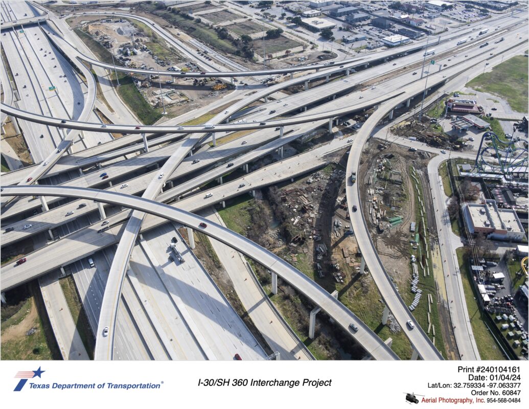 I-30 and SH 360 interchange looking southeast at construction of Six Flags Dr between SH 360 and I-30.